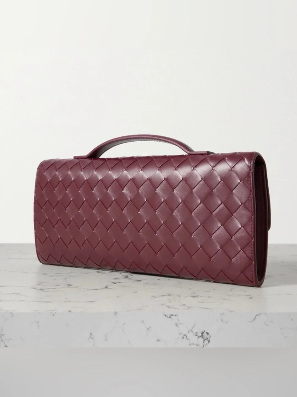 BOTTEGA VENETA Andiamo knot Intrecciato leather clutch